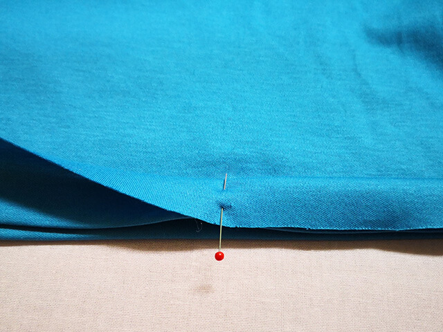 裾をもう一度折る